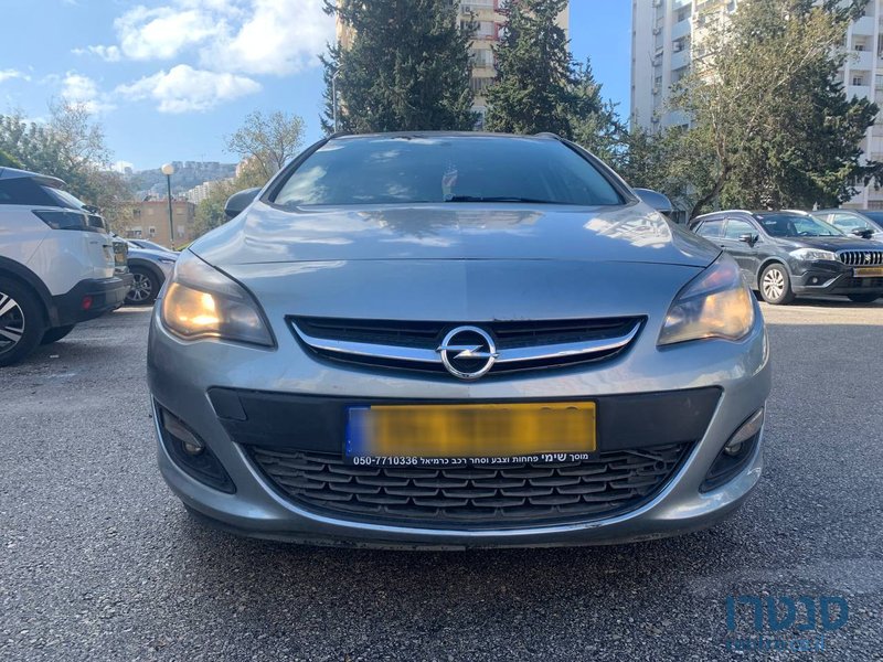 2014' Opel Astra Универсал photo #1