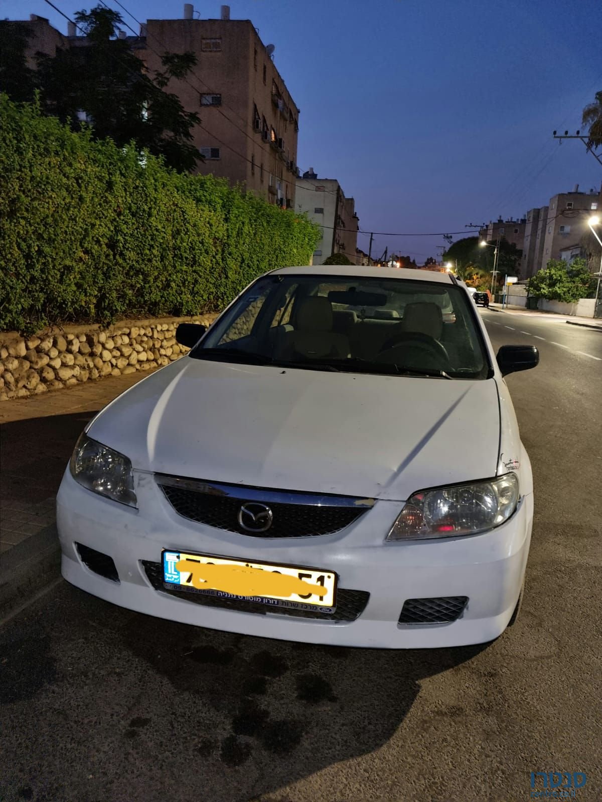 2004' Mazda 323 מאזדה לאנטיס photo #3