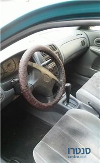 1999' Mazda 323 photo #3