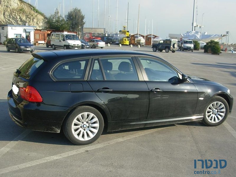 2009' BMW 318 photo #3