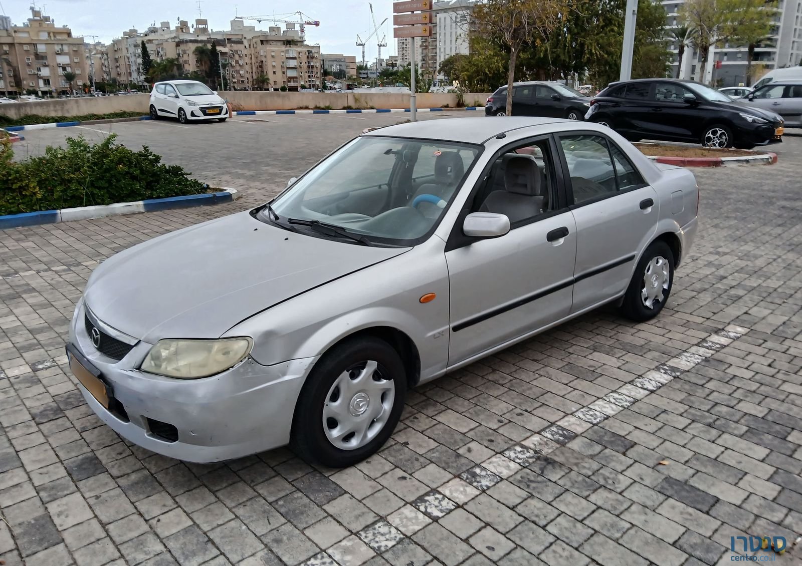 2004' Mazda 323 מאזדה photo #1