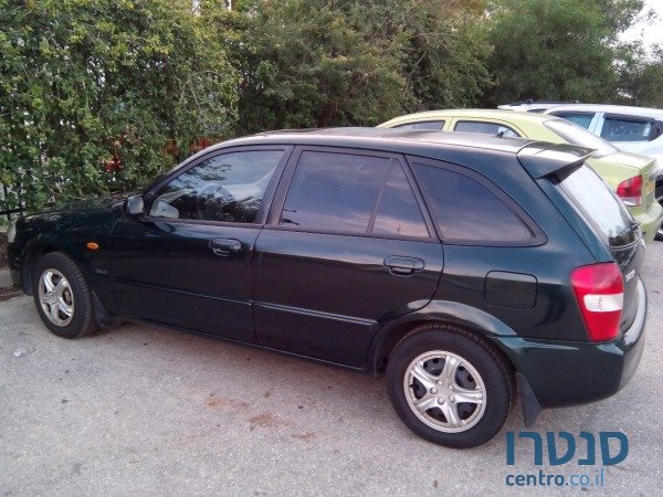 1998' Mazda 323 photo #1