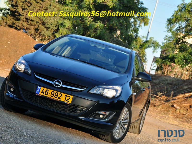 2012' Opel Astra 1.6T automatic Berlina photo #1