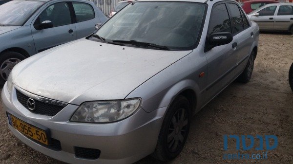 2003' Mazda 323 photo #1