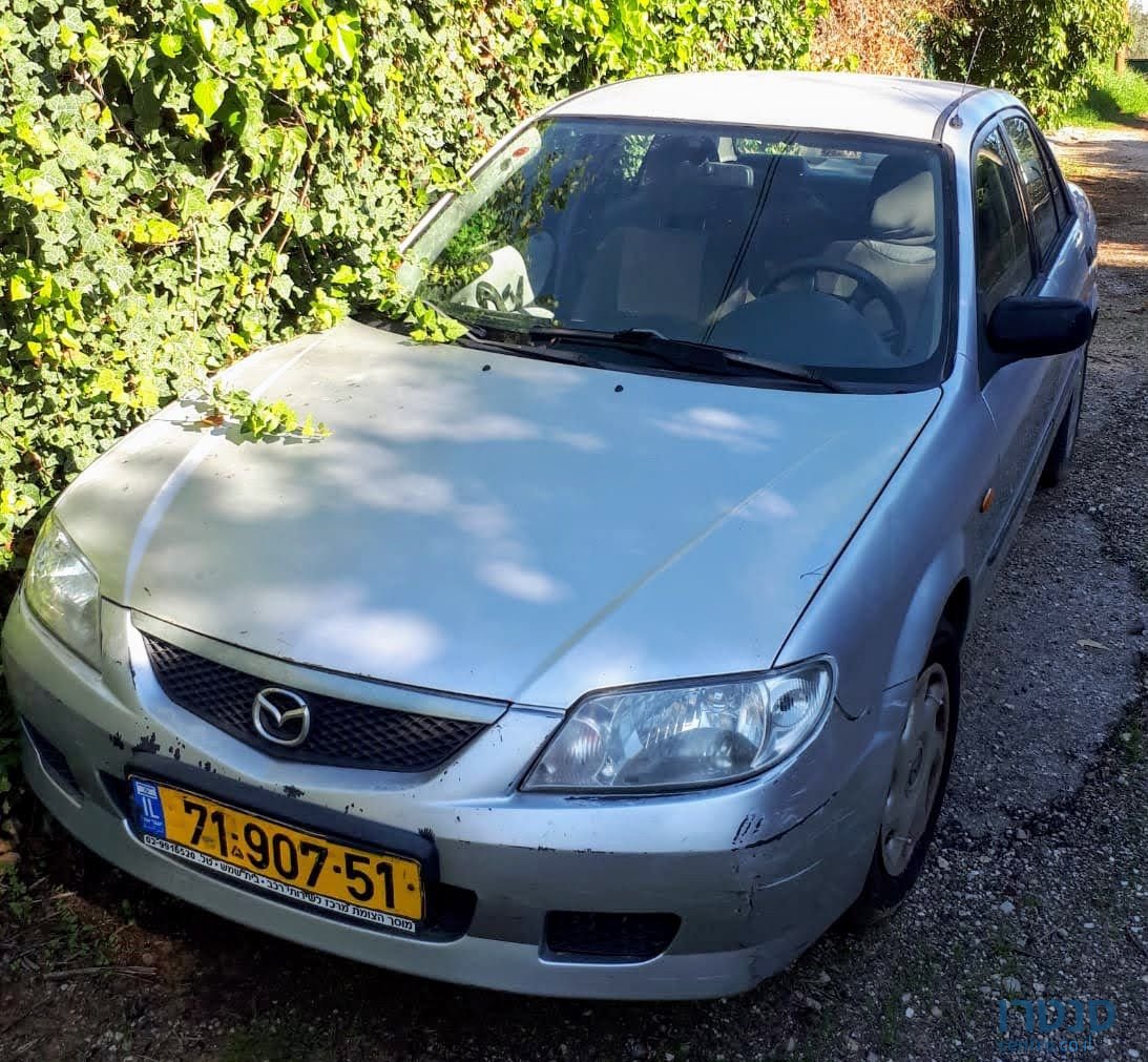 2004' Mazda 323 מאזדה לאנטיס photo #1