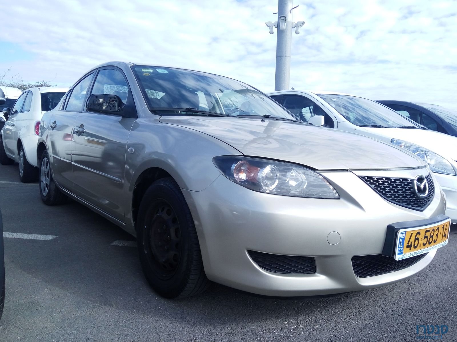 2006' Mazda 3 photo #1