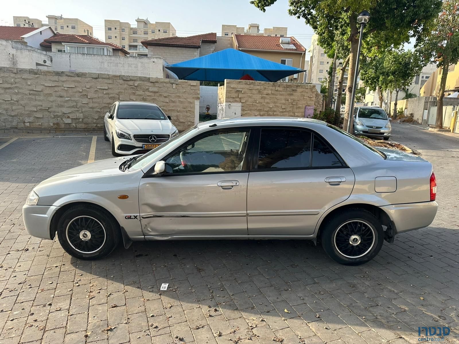 1999' Mazda 323 מאזדה לאנטיס photo #6