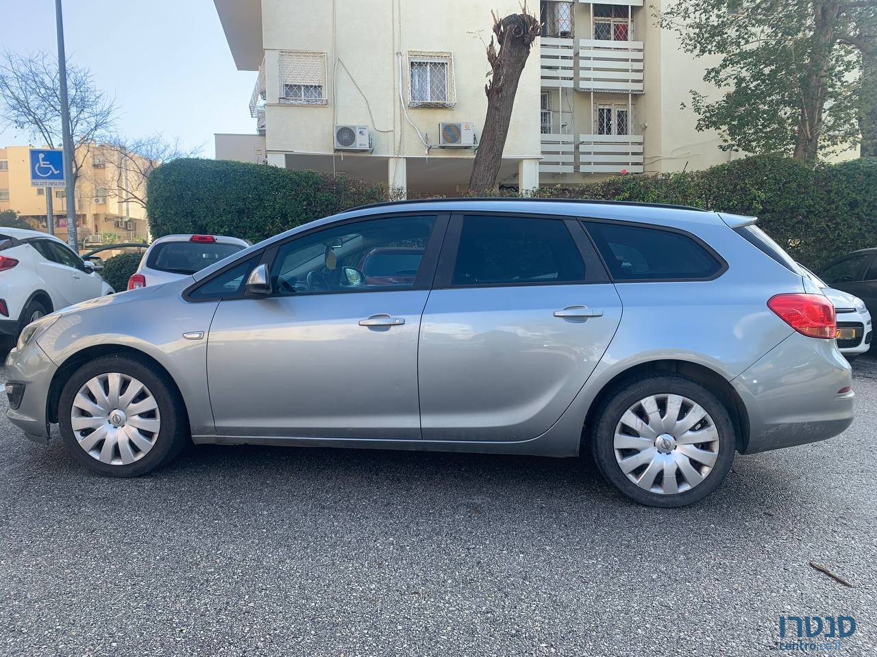 2014' Opel Astra Универсал photo #4