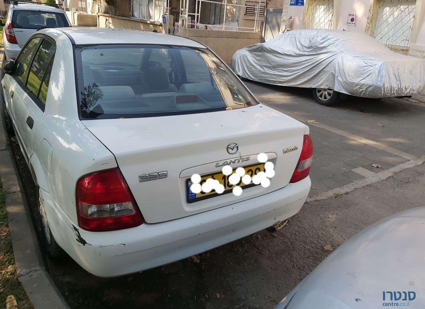 2001' Mazda Lantis 323 מאזדה 323 לאנטיס photo #1