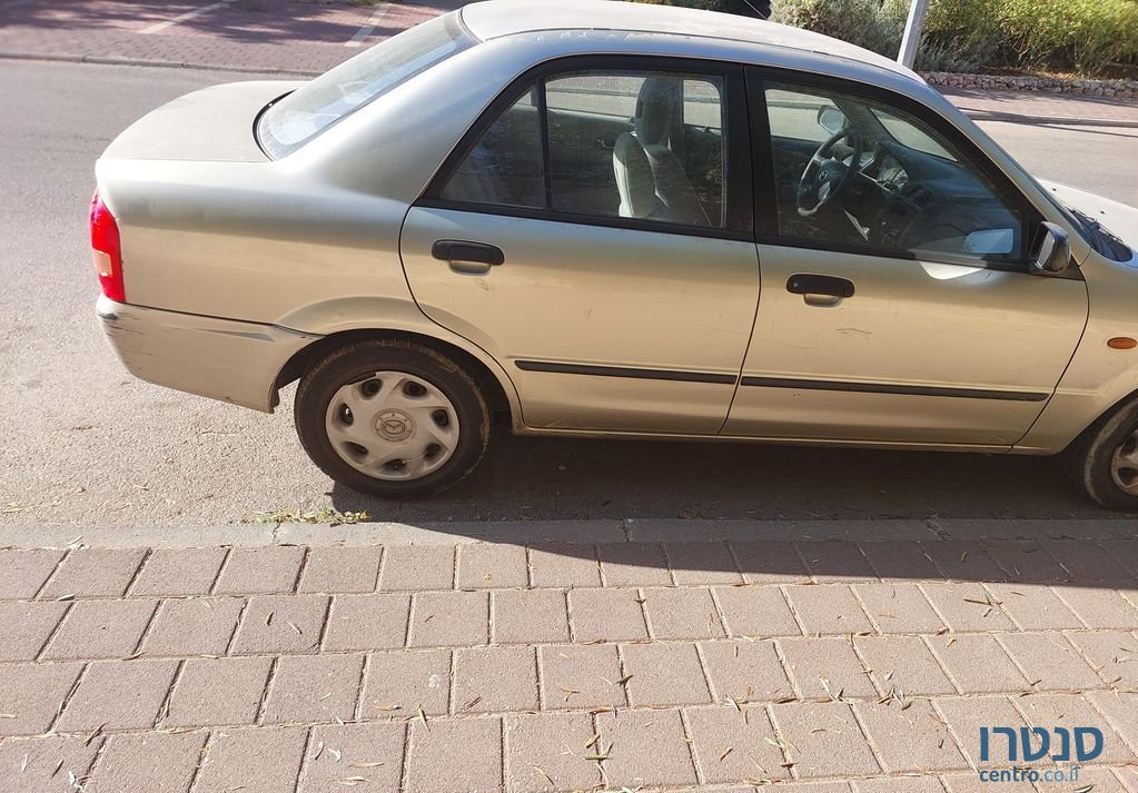 2003' Mazda 323 מאזדה לאנטיס photo #4