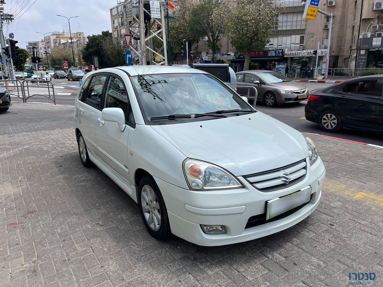 2009' Suzuki Liana photo #4