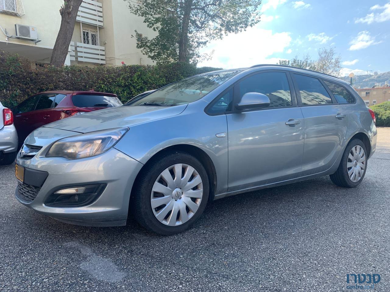 2014' Opel Astra Универсал photo #3