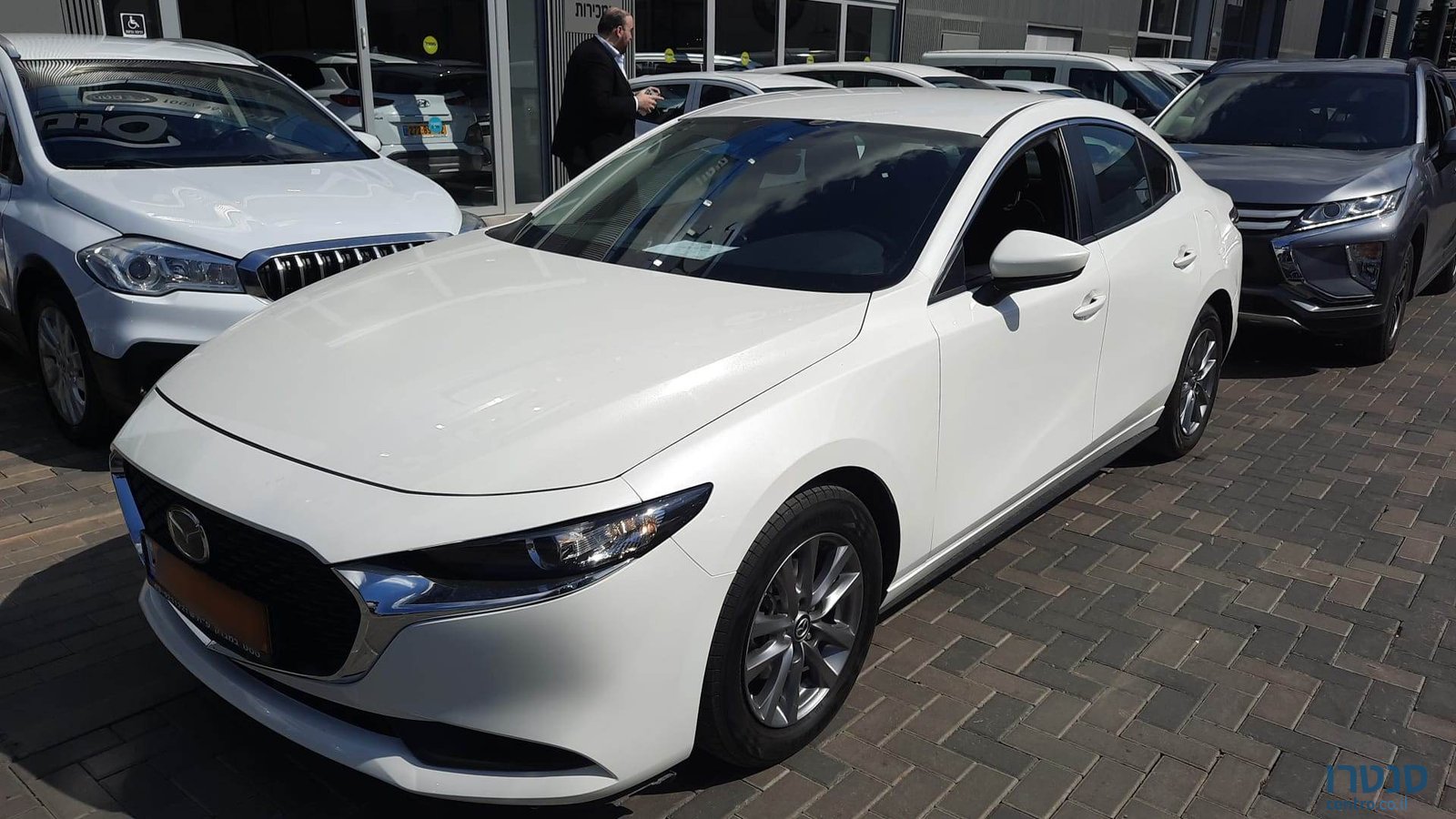 2021' Mazda 3 COMFORT photo #1