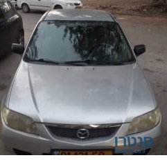 2003' Mazda 323 photo #1