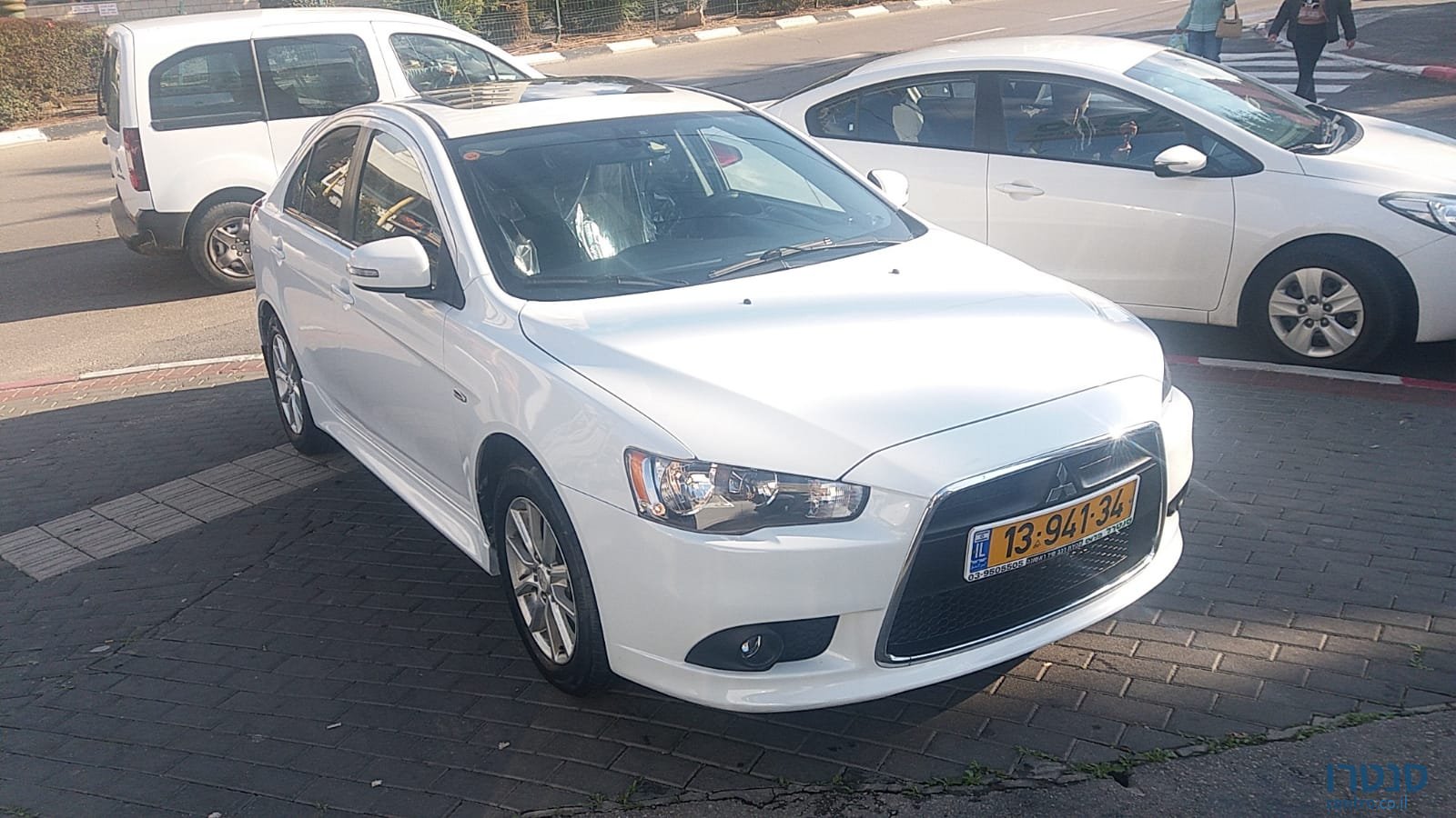 2015' Mitsubishi Lancer photo #1