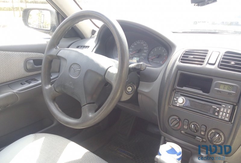 1999' Mazda 323 photo #2