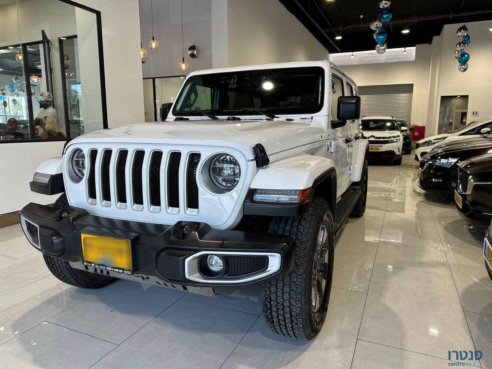 2021' Jeep Wrangler Sahara photo #1