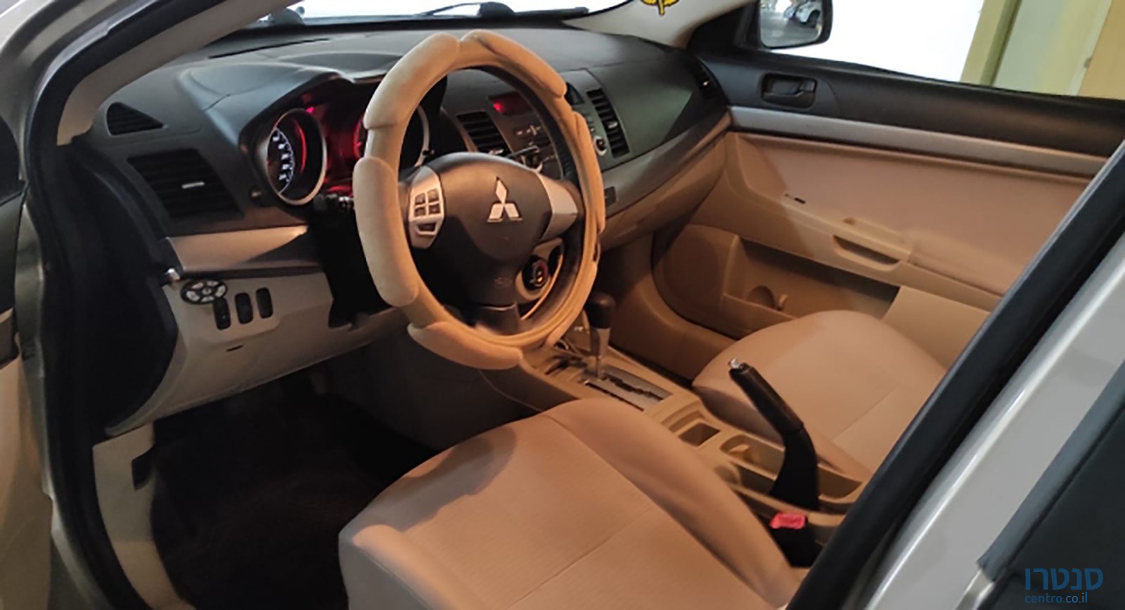 2014' Mitsubishi Lancer photo #3