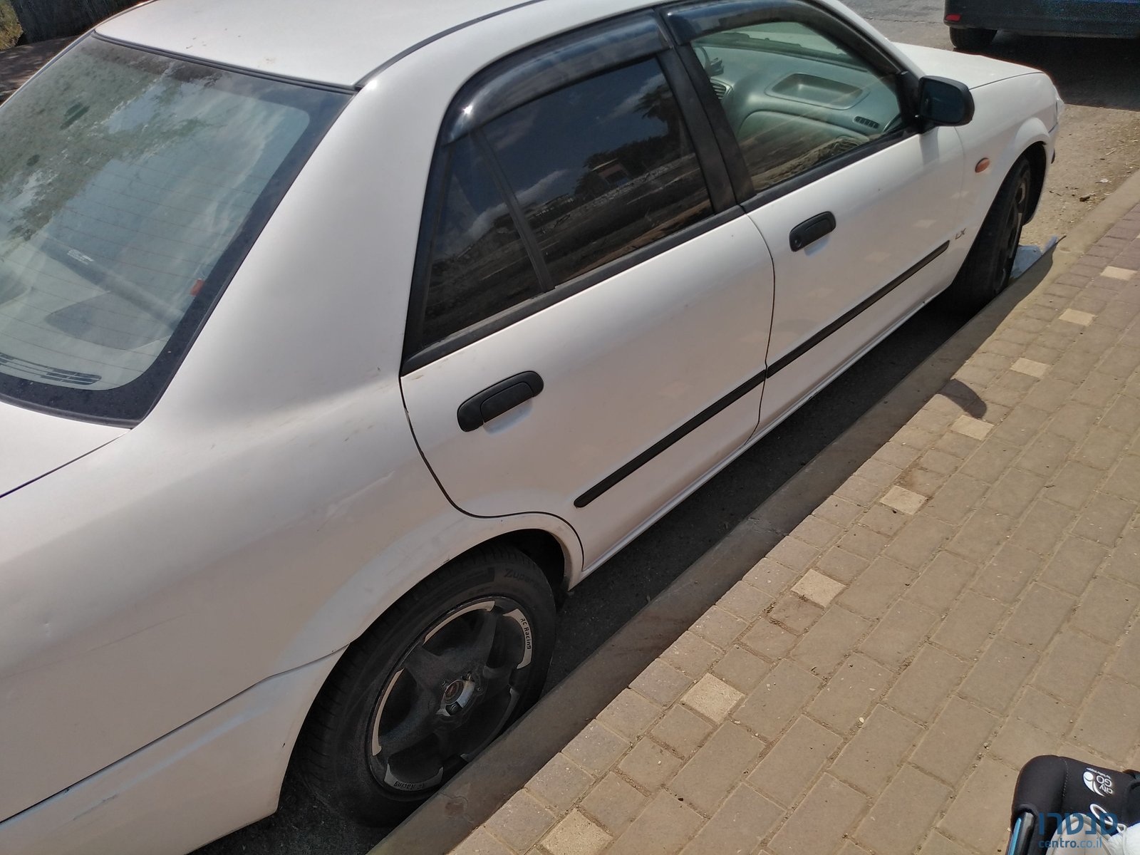 2001' Mazda 323 מאזדה לאנטיס photo #4