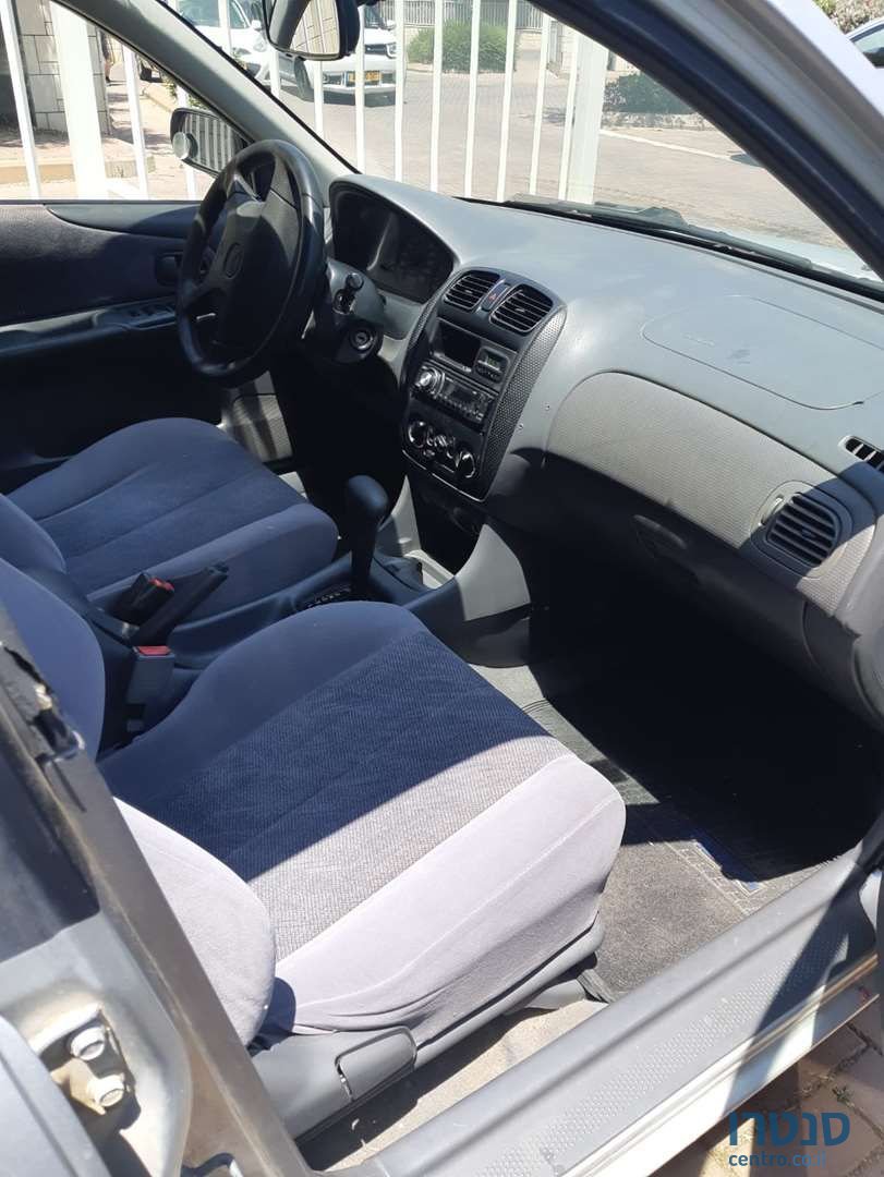 1999' Mazda 323 מאזדה לאנטיס photo #4