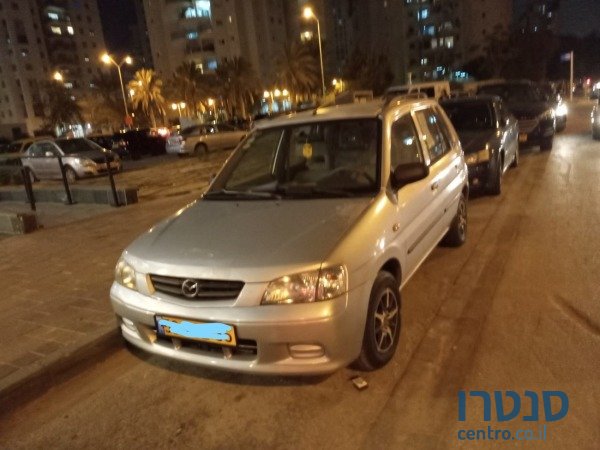 2002' Mazda Demio photo #1