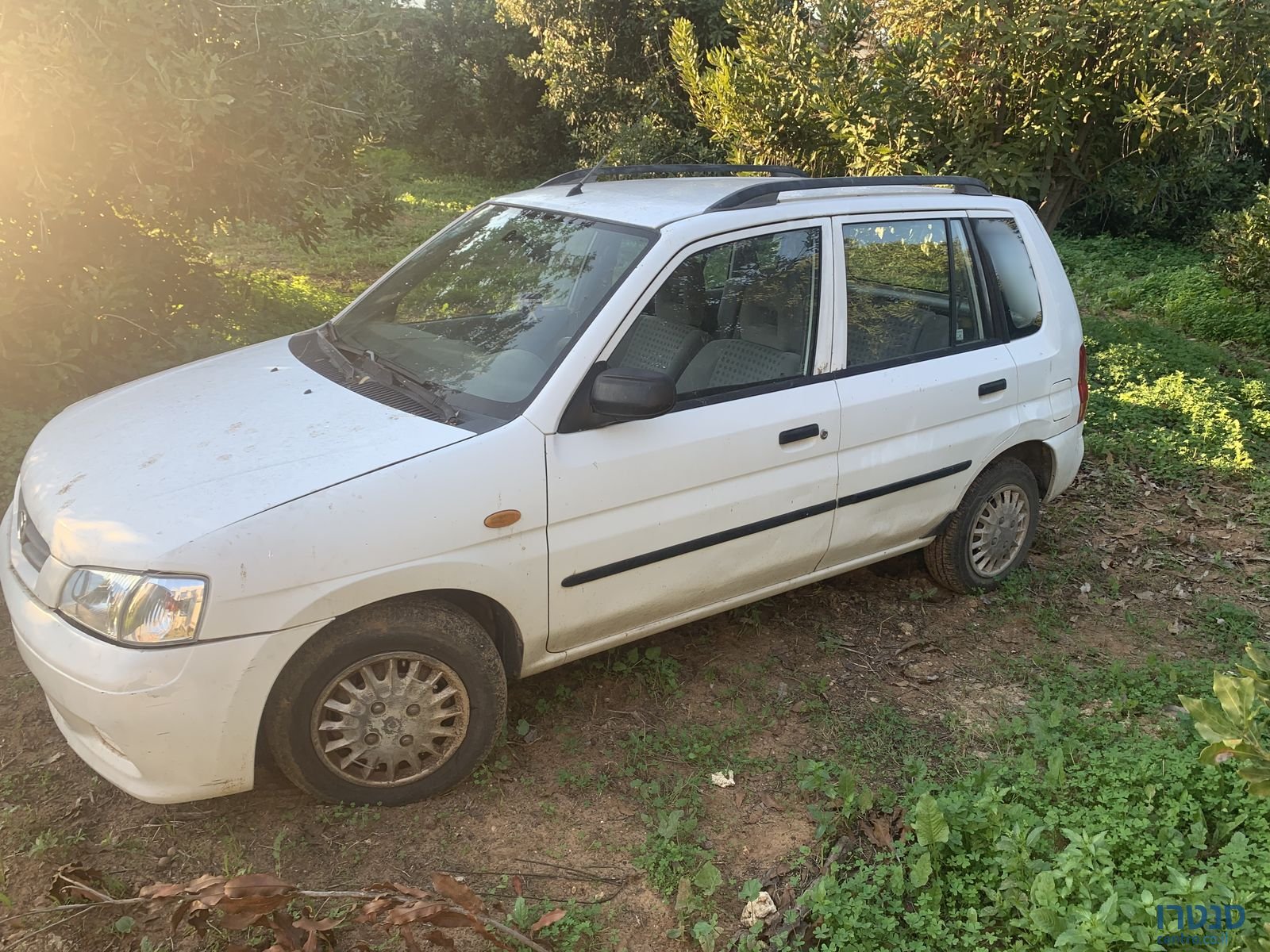 2003' Mazda Demio מאזדה דמיו photo #1