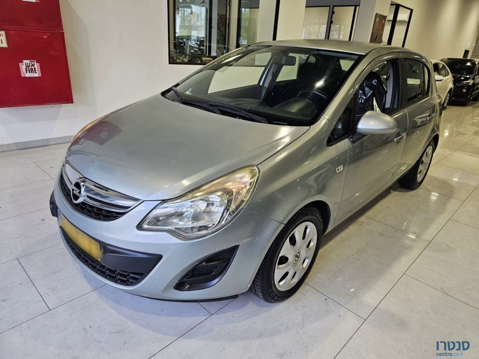 2012' Opel Corsa photo #1