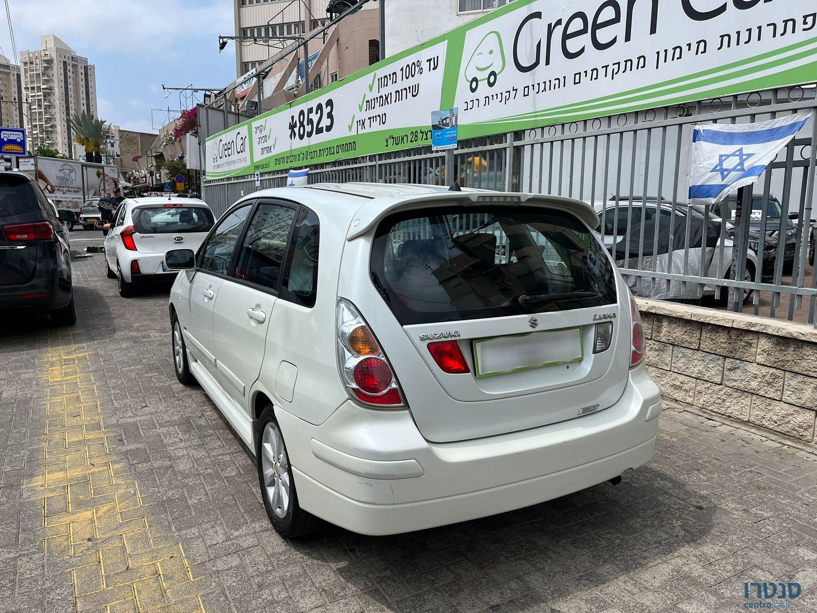 2009' Suzuki Liana photo #2