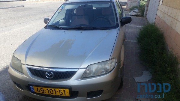 2003' Mazda 323 F photo #2