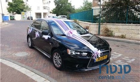 2013' Mitsubishi Lancer photo #2