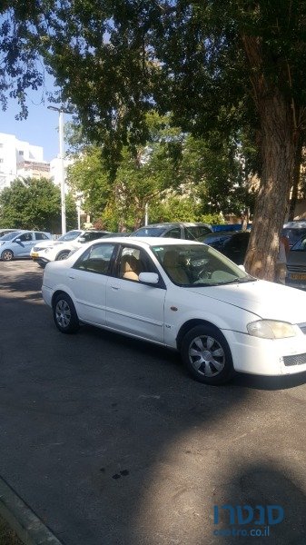 2000' Mazda 323 photo #1