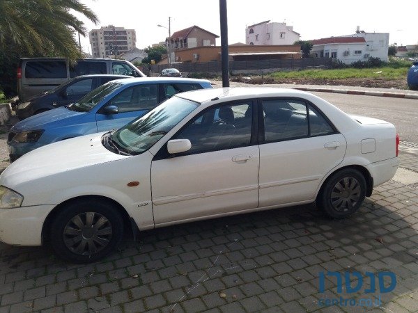 2000' Mazda 323 photo #1