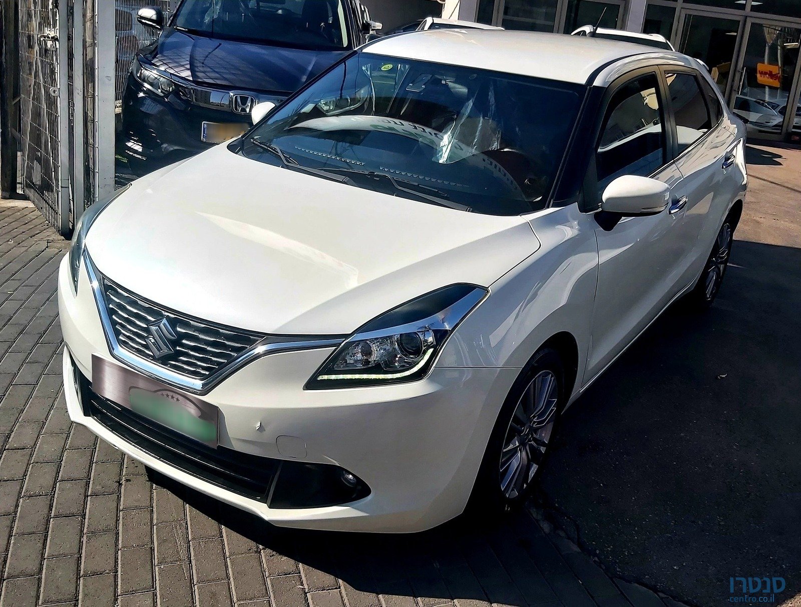 2019' Suzuki Baleno photo #1