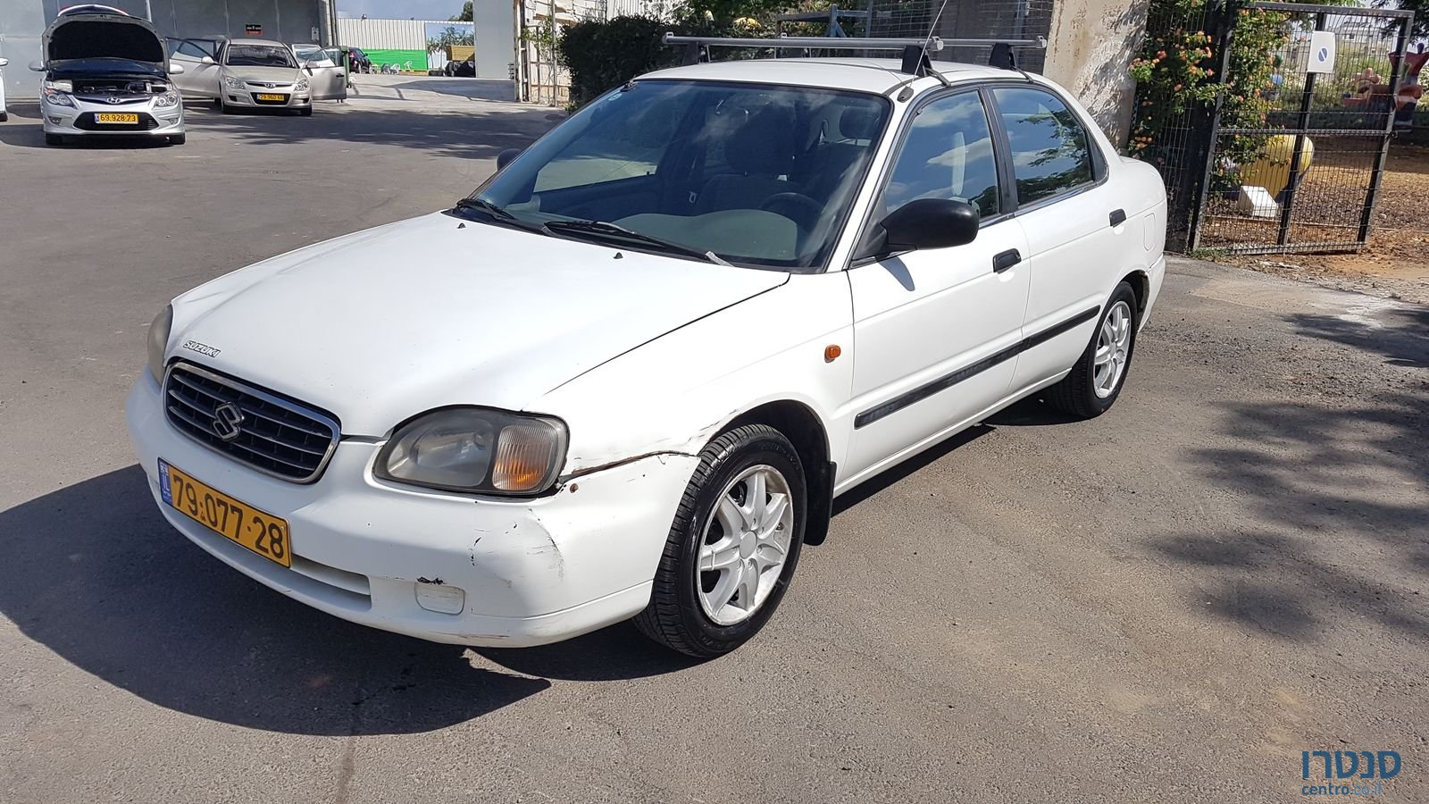 2002' Suzuki Baleno photo #1