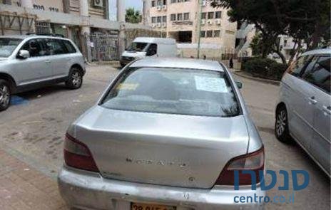 2002' Subaru Impreza Newage 1600 photo #1