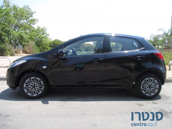 2008' Mazda 2 photo #1