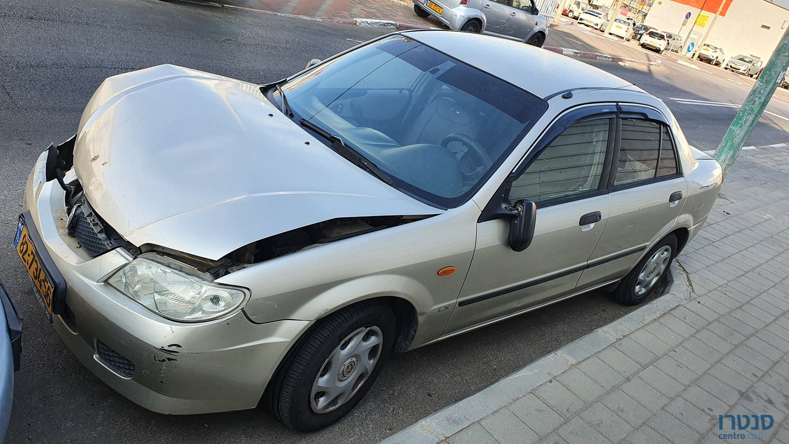 2004' Mazda 323 מאזדה לאנטיס photo #1