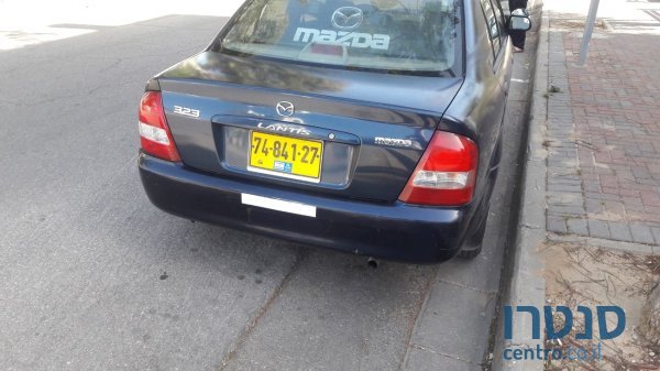 1999' Mazda 323 photo #2