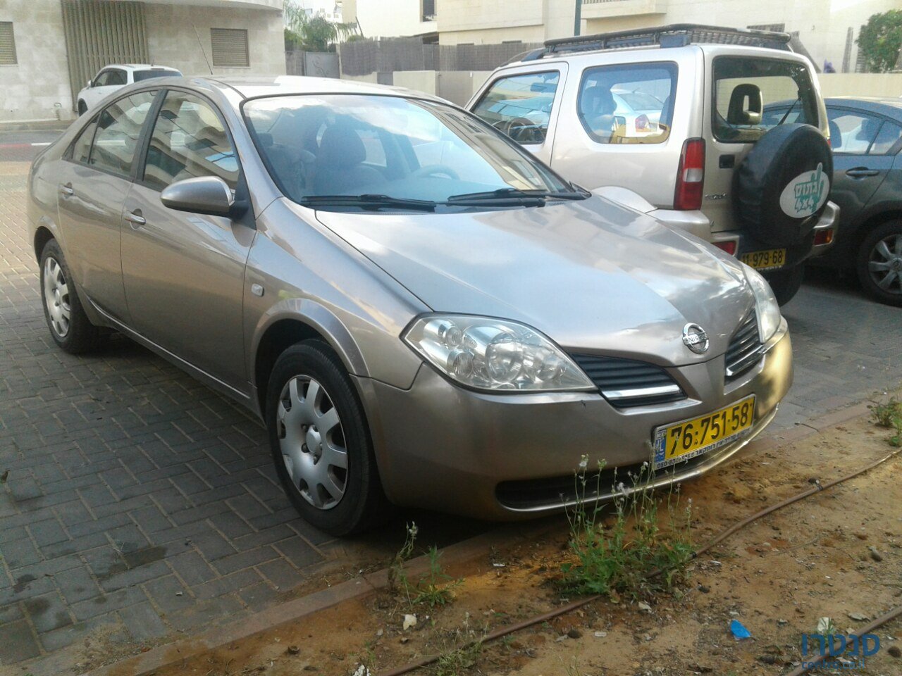 2006' Nissan Primera photo #1