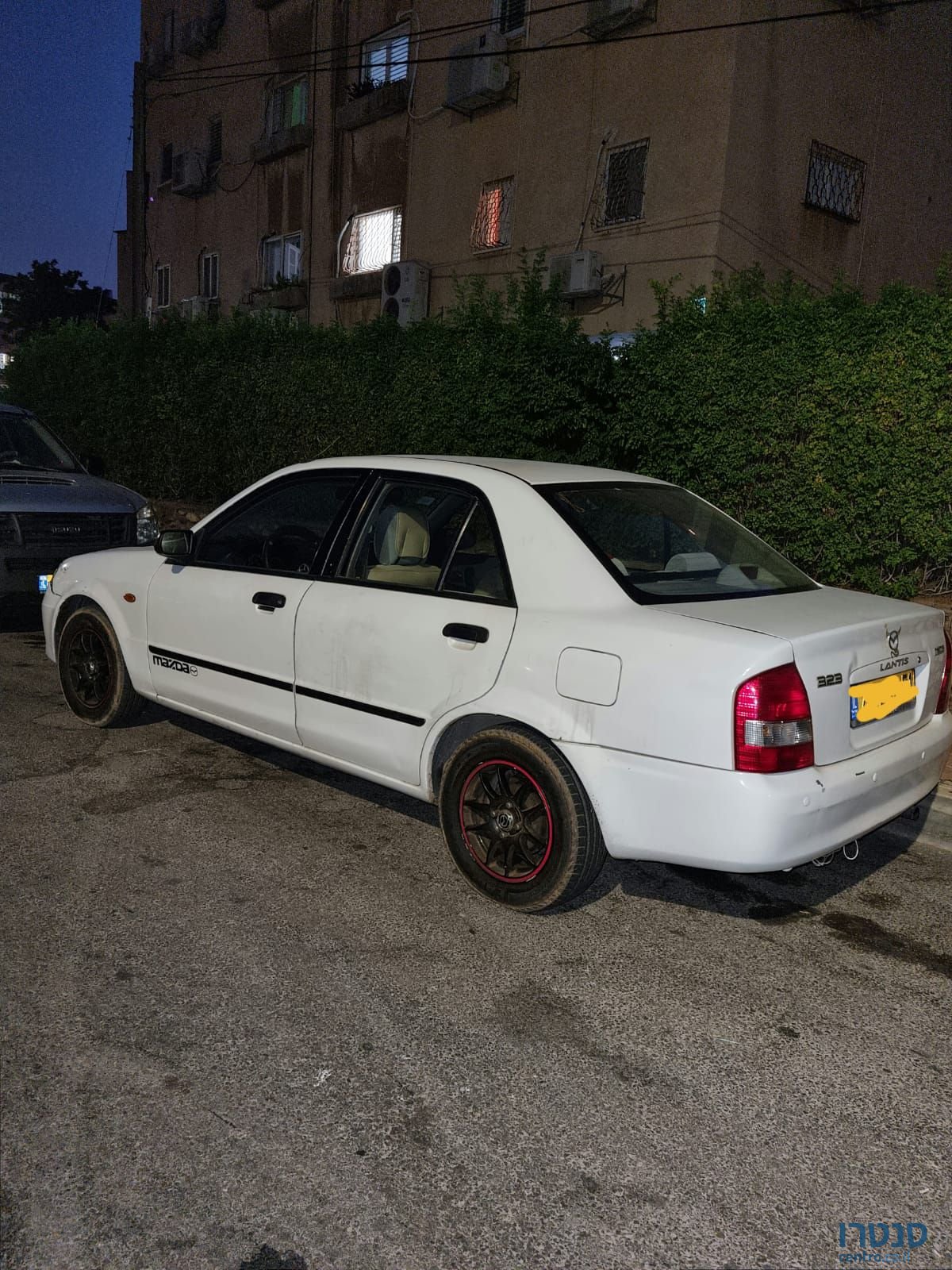 2004' Mazda 323 מאזדה לאנטיס photo #1