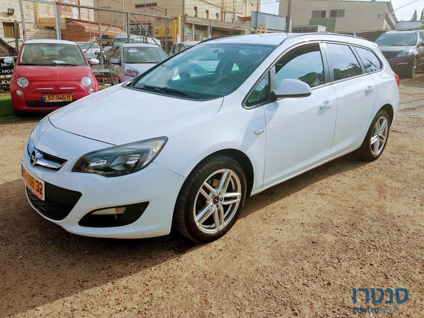 2014' Opel Astra photo #1