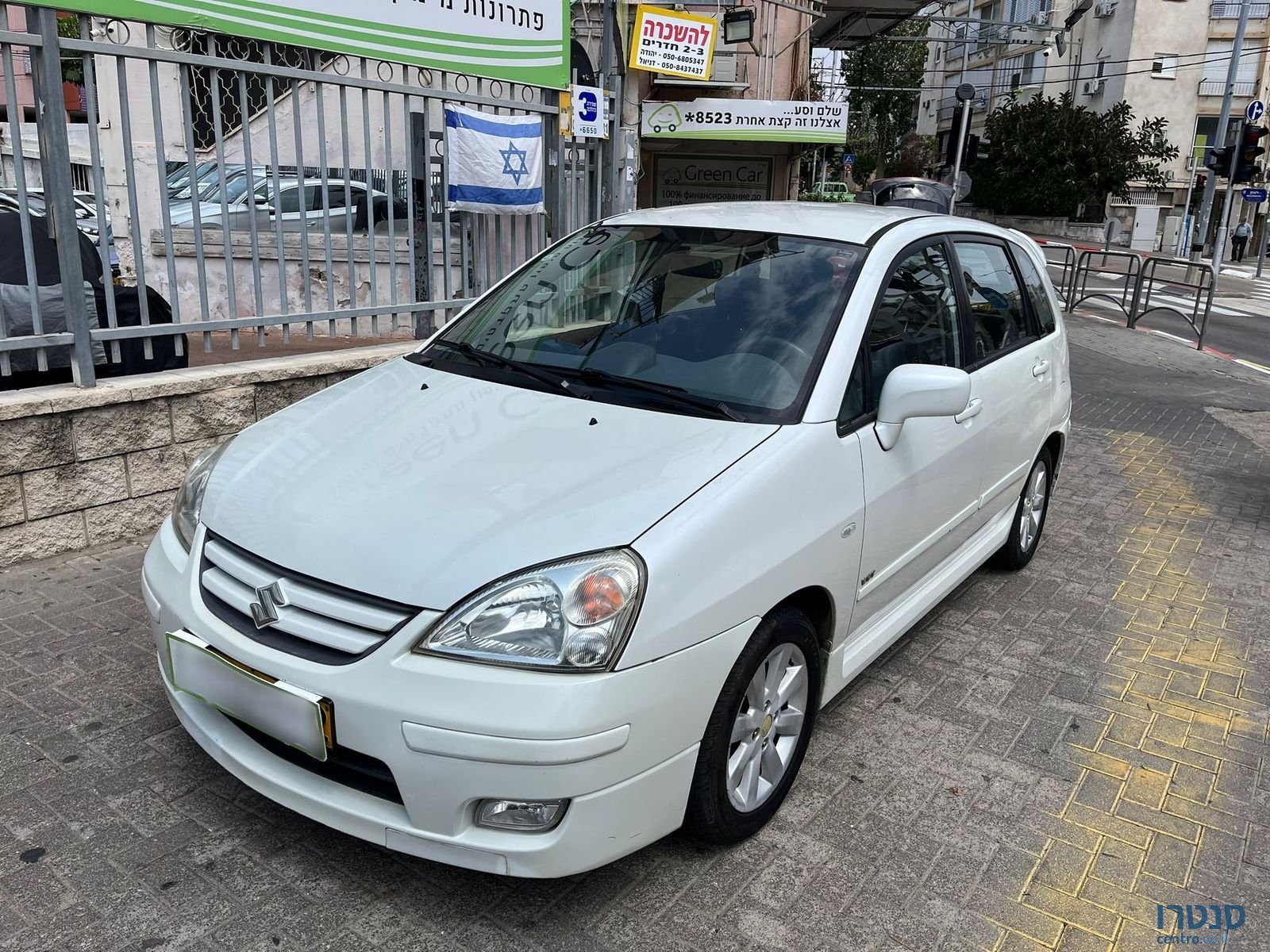 2009' Suzuki Liana photo #1